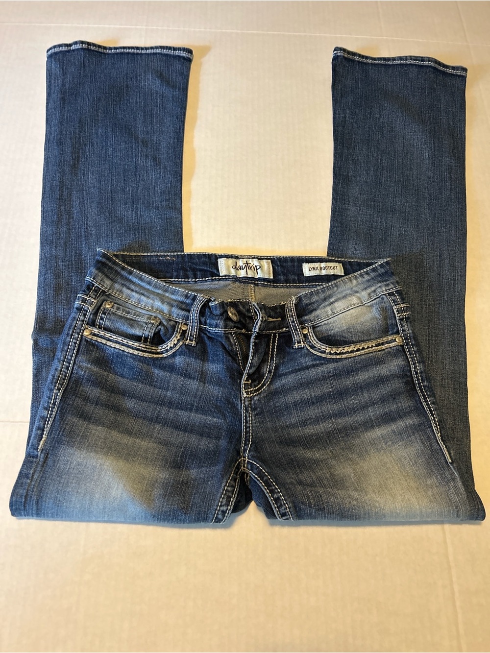 Daytrip Women's Dark Blue Boot Cut Jeans with Faded Wash